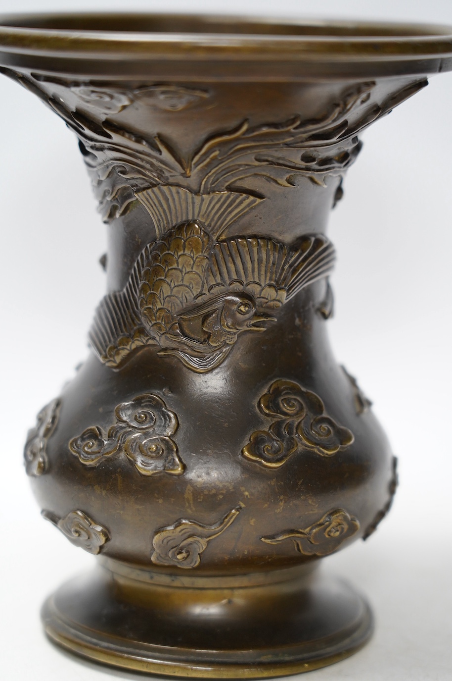 A 19th century Chinese cast bronze ‘phoenix’ vase, seal mark to the base, 17cm high. Condition - poor